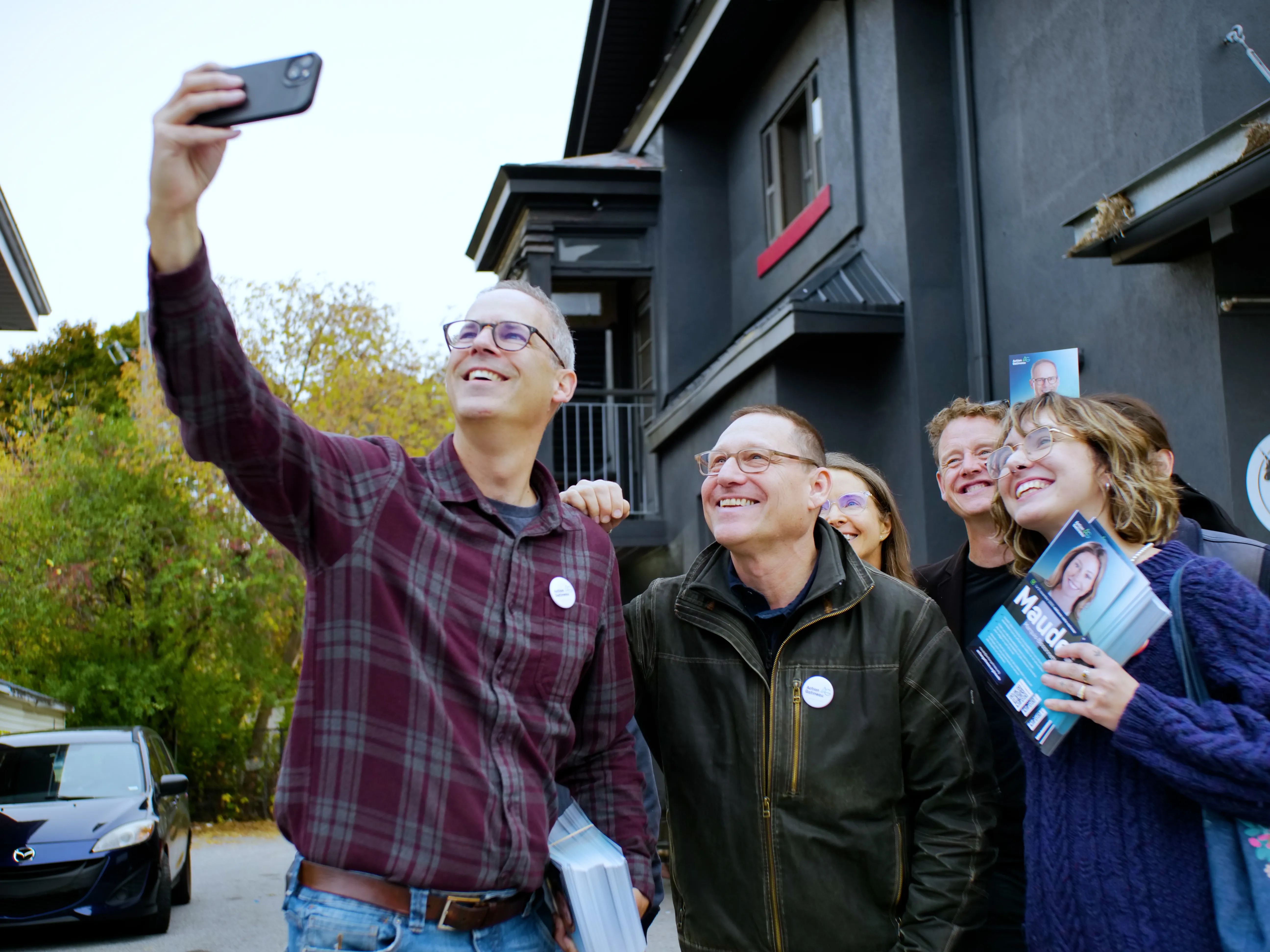 Avi taking selfie with supporters in Ottawa-Gatineau