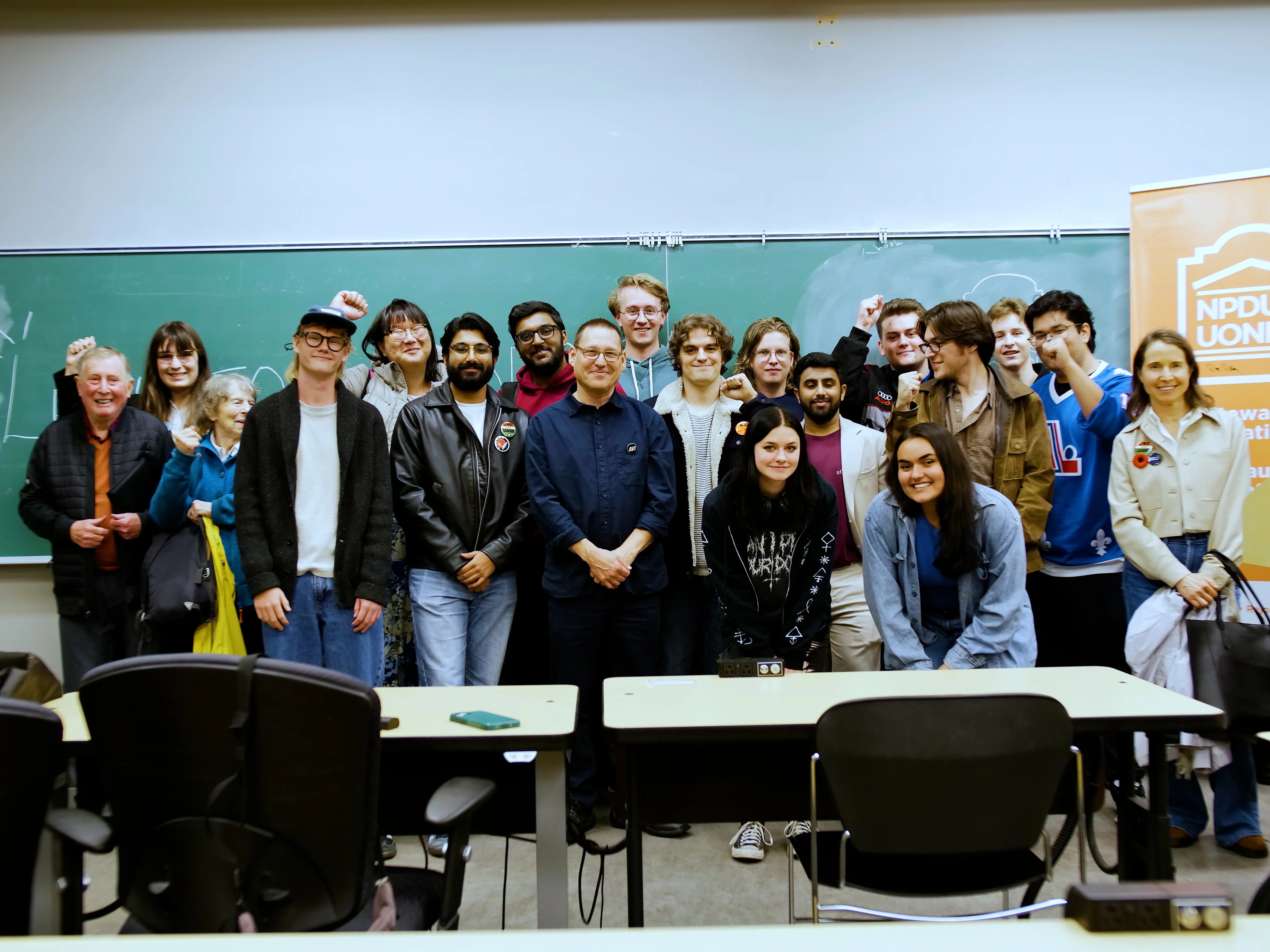 Avi with supporters at campaign office
